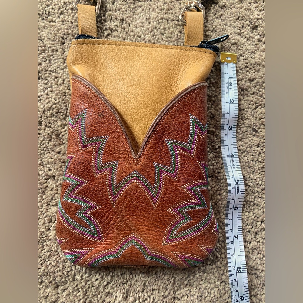 Hip Bag Company cross body cell phone purse. Leather with cowboy boot details.
